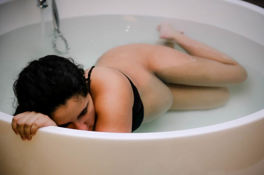 Woman in birthing pool